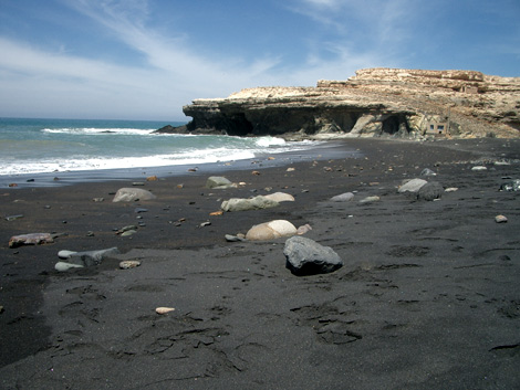 Ajuy beach. In the background is the cliff onto which you can walk.